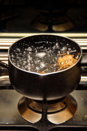 water is boiling in a pan